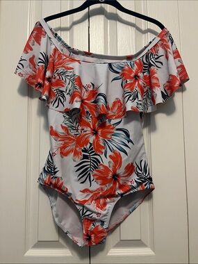 White and orange one piece bathing suit. Size medium